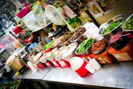 The various ingredients for bibimbap (비빔밥) are laid out. I got the impression that you get to pick and choose.